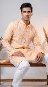 Model_sitting_in_peach_kurta_2K_20261021200230.webp